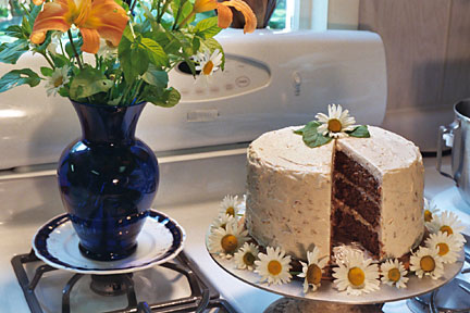 moist and delicious gourmet carrot cake with rich vanilla cream cheese-walnut icing for your wedding, birthday, or any special occasion!